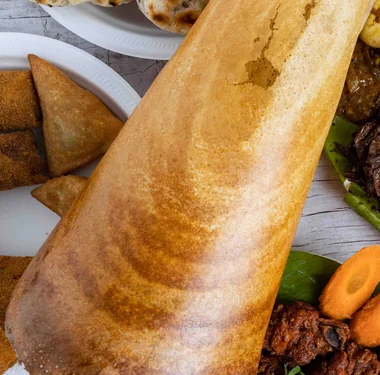 Paper dosa rolled into a tall cone, from SLS Eazy Carry in Mississauga